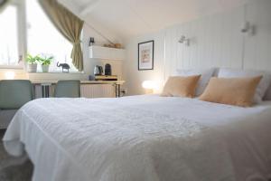 Postel nebo postele na pokoji v ubytování B&B De Dream
