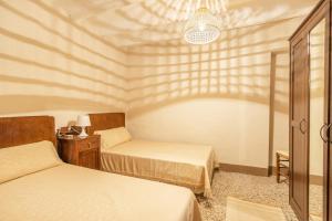 Ένα ή περισσότερα κρεβάτια σε δωμάτιο στο Casa Estel Miracle