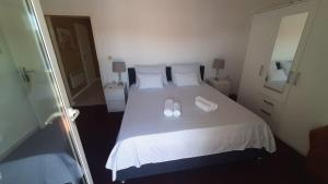 Postel nebo postele na pokoji v ubytování Apartments Lapa