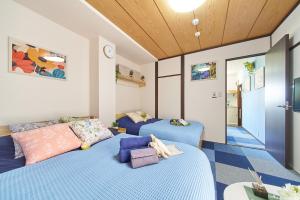 Postel nebo postele na pokoji v ubytování Belmont 303 3min to Station Easy Access Ueno Asakusa Skytree Sleeps 4