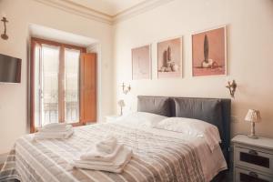 A bed or beds in a room at Wp Relais Renaissance Retreat