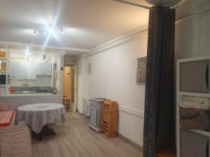 Kuchyň nebo kuchyňský kout v ubytování Apartamentos Grifovacances Consuegra 1