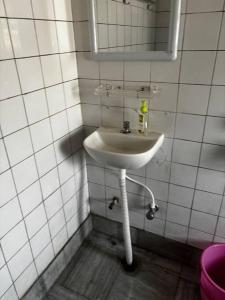 Koupelna v ubytování Sai-Abode Homestay