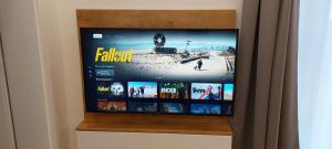 TV in/ali zabaviščno središče v nastanitvi Apartmán SKI Plešivec