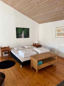 Postel nebo postele na pokoji v ubytování Strandvägen 6B Stig