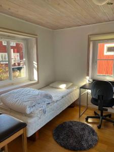 Postel nebo postele na pokoji v ubytování Strandvägen 6B Stig