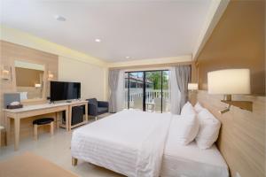 TV a/nebo společenská místnost v ubytování Aonang Buri Resort