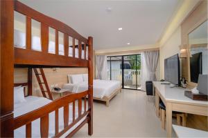 Postel nebo postele na pokoji v ubytování Aonang Buri Resort + 37 fotografií