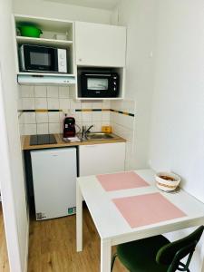 Cucina o angolo cottura di Sphinx Résidences - Tempologis Mémorial