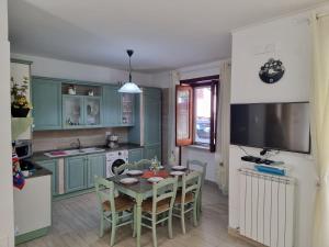 Kuchyň nebo kuchyňský kout v ubytování Rosy Vacation Home