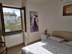 Postel nebo postele na pokoji v ubytování Rosy Vacation Home