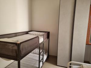 Postel nebo postele na pokoji v ubytování Rosy Vacation Home
