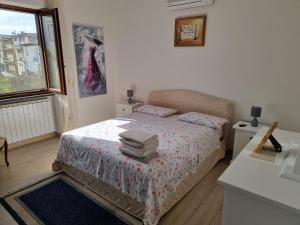 Postel nebo postele na pokoji v ubytování Rosy Vacation Home