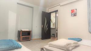 Letto o letti in una camera di Gallary Hostel