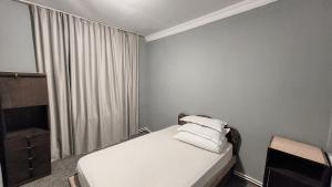 Letto o letti in una camera di Gallary Hostel
