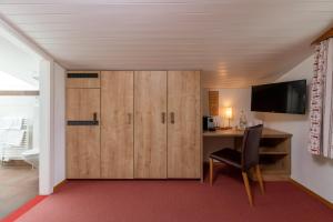 Televisor o centre d'entreteniment de Derby Swiss Quality Hotel