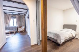 Postel nebo postele na pokoji v ubytování Hotel de France