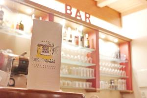 a bar sign on the counter of a store at Hotel Villa Adriana in Monterosso al Mare