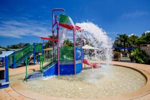 a water park with a water slide at Discovery Parks - Harrington in Harrington