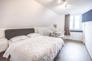 Postel nebo postele na pokoji v ubytování Hotel de France
