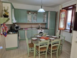 Kuchyň nebo kuchyňský kout v ubytování Rosy Vacation Home