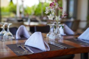 A restaurant or other place to eat at Gouves Bay by Omilos Hotels