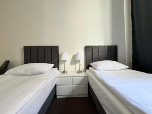 Ένα ή περισσότερα κρεβάτια σε δωμάτιο στο Hotel Mazowiecki WOW