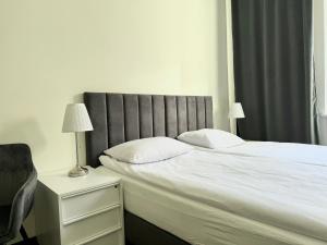 Ένα ή περισσότερα κρεβάτια σε δωμάτιο στο Hotel Mazowiecki WOW