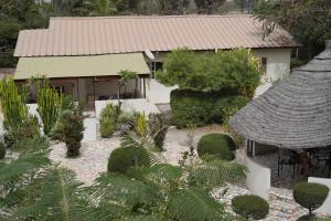 an aerial view of a house with a garden at Dafa Tanga Lodge in Sanyang