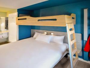 Postel nebo postele na pokoji v ubytování ibis Budget Le Treport Mers Les Bains + 26 fotografií