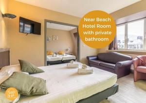 Postel nebo postele na pokoji v ubytování Sleep & Go Blankenberge