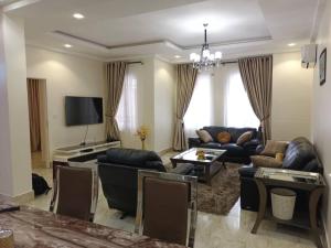 TV a/nebo společenská místnost v ubytování Unit 1 apartments