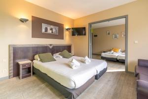 Postel nebo postele na pokoji v ubytování Sleep & Go Blankenberge