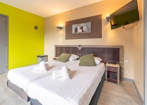 Postel nebo postele na pokoji v ubytování Sleep & Go Blankenberge