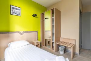 Postel nebo postele na pokoji v ubytování Sleep & Go Blankenberge