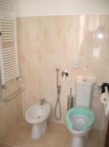 A bathroom at Hotel Agli Artisti