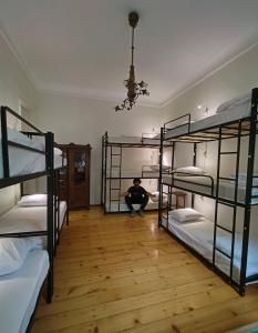 Voodi või voodid majutusasutuse Ambience Hostel & Apartments toas