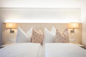 Posteľ alebo postele v izbe v ubytovaní Hotel Tauernblick