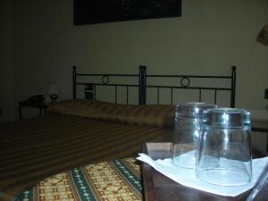 A bed or beds in a room at Hotel Agli Artisti
