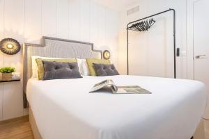 Posteľ alebo postele v izbe v ubytovaní Genteel Home Recogidas