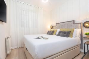 Posteľ alebo postele v izbe v ubytovaní Genteel Home Recogidas