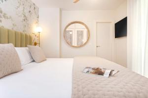 Posteľ alebo postele v izbe v ubytovaní Genteel Home Recogidas + 37 fotografií