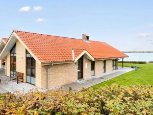 an image of a house with an orange roof at 6 person holiday home in Egernsund in Egernsund +36 photos