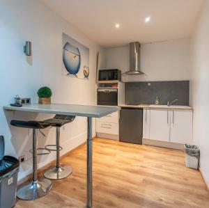 Dapur atau dapur kecil di Sleep & Go Menen