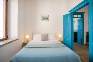 Ένα ή περισσότερα κρεβάτια σε δωμάτιο στο Serena Traditional Suite