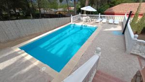 Bazén v ubytování Chalet El Tochar nebo v jeho okolí