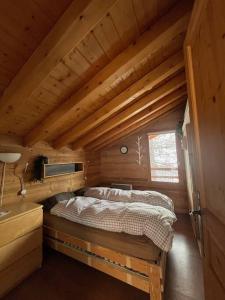 Postel nebo postele na pokoji v ubytování Chalet tout confort dans la résidence les chalets du Mercantour isola 2000
