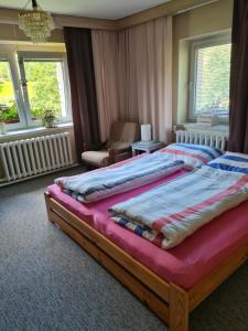 Postel nebo postele na pokoji v ubytování Apartmán AZ