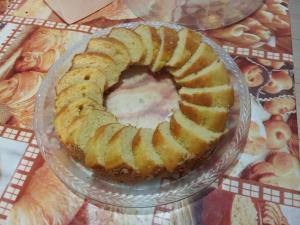 a pie in a glass bowl on a table at Pousada Vila Pitanga in Santos