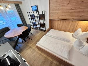 Letto o letti in una camera di Pension Ahorn